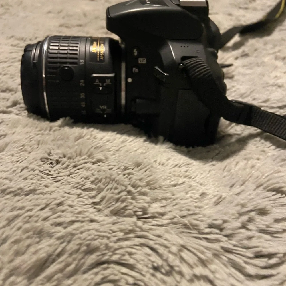Like new. I am including, the extra lense and bag purchased separately.